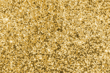 Gold glitter texture sparkling shiny wrapping paper background for Christmas holiday seasonal wallpaper  decoration, greeting and wedding invitation card design element