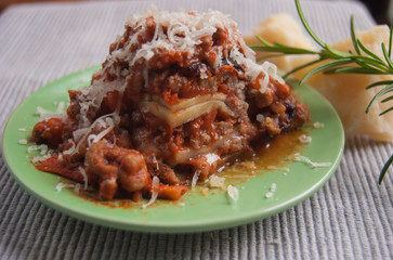 Aubergines with layered of minced meat and grated cheese