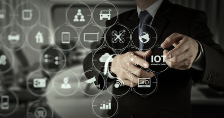 Businessman hand pressing an imaginary button