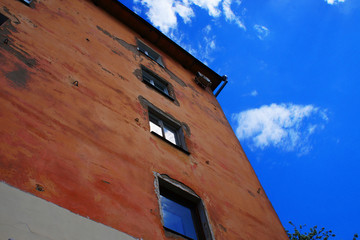 old brick house against the sky