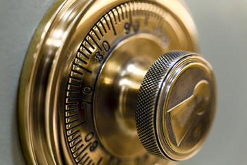 Combination safe lock, in golden duotone.