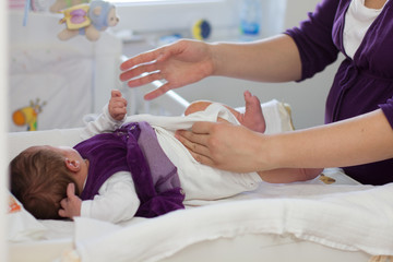Obraz na płótnie Canvas Changing Diaper Baby