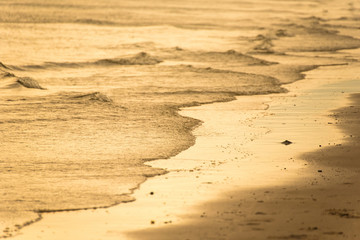 Beautiful white sand beach, clear wave water, white sand and sea nature sunset time.Thailand.
