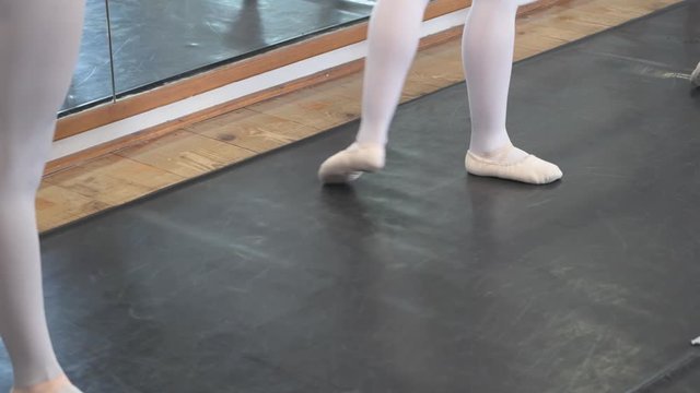 4K young ballerina during ballet class