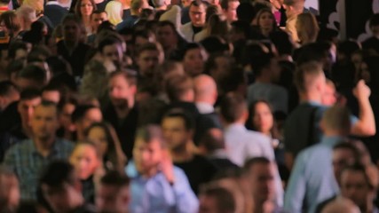 Crowd of walking people walking indoors. Overpopulation concept