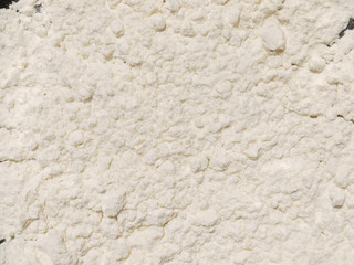 Surface covered with the wheat flour as a background