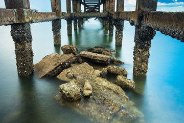 Under The ruins of Jetty, Photo long exposure, Seascape of thailand.