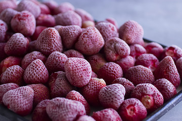 Frozen strawberry close-up. Food background.