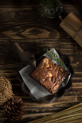 brownie chocolate macadamia baked sweet on wood background