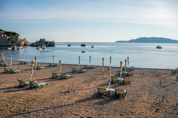 MONTENEGRO, PRZNO  - JUNE 05/2017: tourists swim in the Adriatic Sea during sunset.