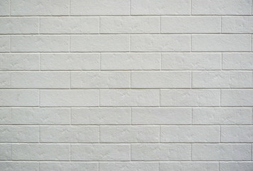 A white brick wall. Stone wall texture. Decorative tile. Textured background