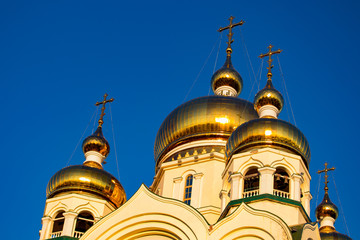 Fototapeta na wymiar Beautiful view of the Transfiguration Cathedral. Sunset. Dome Shine. Russia, Khabarovsk.