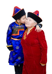 grandson kisses his grandmother