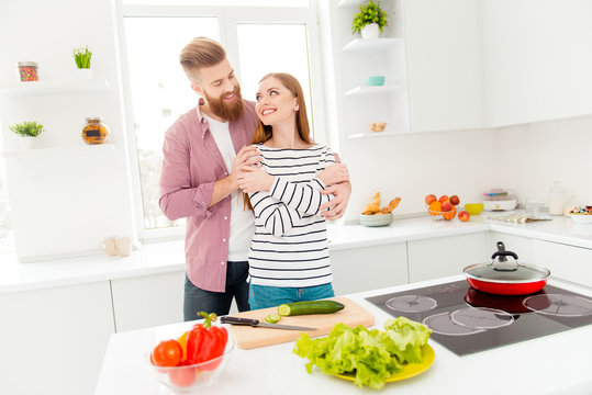 Joy happiness cuddling trust support understanding idyllic harmony concept. Portrait of romantic stylish couple in casual outfits bonding while preparing vegetable salad keeping healthy lifestyle