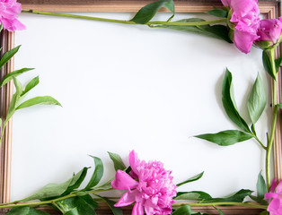 Mocup notebook with a clean sheet of pink peonies