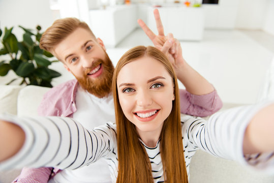 Pov face comfort hipster photo partners funny funky teenager romantic lifestyle leisure concept. Close up portrait of cheerful excited rejoicing delightful young students taking picture in modern flat