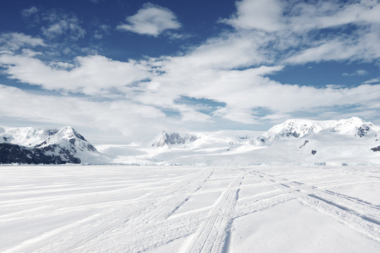 empty brick ground with sonw mountain as background