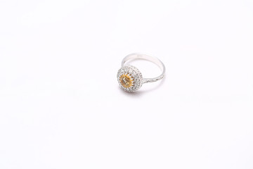 Yellow gem stone and diamond ring