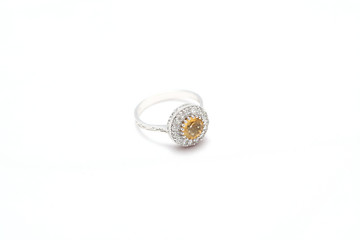 Yellow gem stone and diamond ring