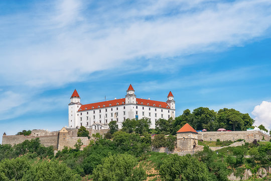 Bratislava, Slovakia - May 24, 2018: View of Bratislava castle which occupies a prominent location in the city overlooking the Danube river. 