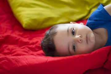 Baby lying in bed