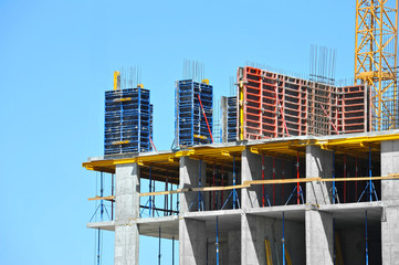 Crane and highrise construction site