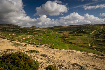 Fototapeta na wymiar Gozo interior rural landscape, terraced fields around San Lawrenz and Dwejra Bay, countryside Malta, winter.