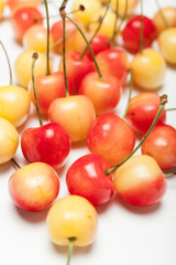 Rainier yellow cherry dessert, delicious bowl with berry.