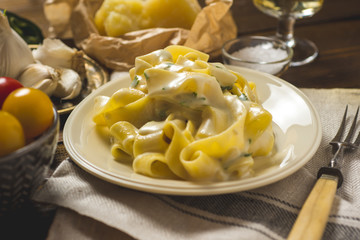 Alfredo Pasta Plate with Creamy Cheese and Basil Sauce