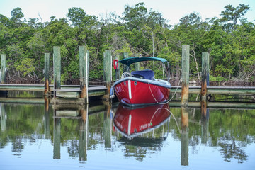 Obraz premium Red Boat Docked Florida