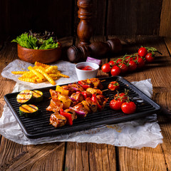 Rustic shish kebab skewers with marinated ham meat paprika and red onion