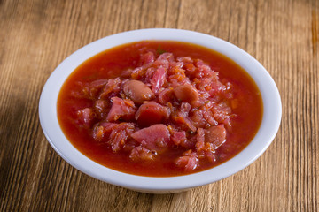 Vegetable soup - red borsch, closeup. Healthy beetroot soup, vegetarian food. Ukrainian and russian national food - red beet soup, borscht