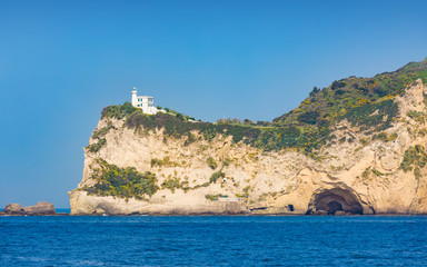 Fototapeta na wymiar Cape Miseno Lighthouse, Napoli, Italy in sunny summer day