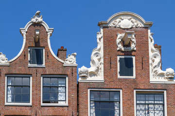 Fototapeta na wymiar Typical Amsterdam Buildings with Gable