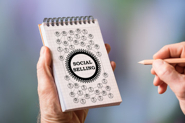Social selling concept on a notepad