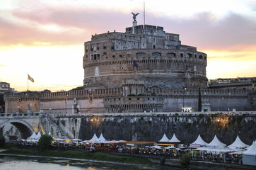 View of the Saint Angel Castle and the Tiber river on the sunset in Rome,Italy.
