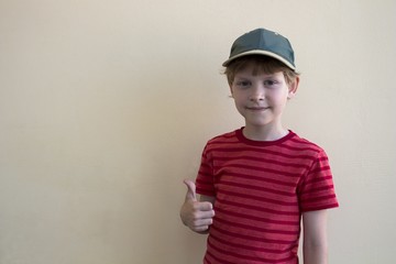 boy showing a thumbs up