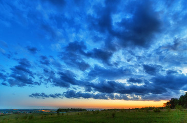 Sunset sky after the rain over the russian plain