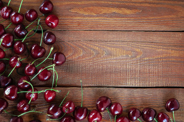 Sweet cherry on a wooden background