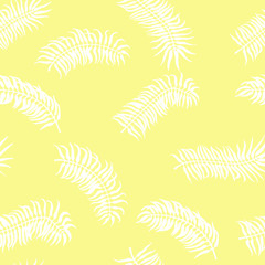 Fototapeta na wymiar Seamless tropical pattern. Palm leaves on the yellow background