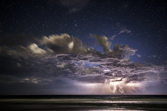 Long exposure of stormy cloud over sea