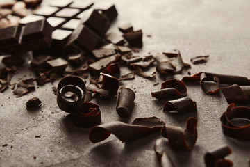 Chocolate curls on grey background