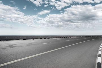 empty asphalt road with landscape