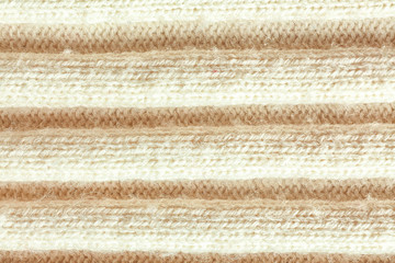 Fototapeta na wymiar Knitted fabric texture, closeup