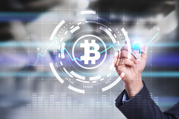 Cryptocurrency graph on virtual screen. Business, Finance and technology concept. Bitcoin, Ethereum.