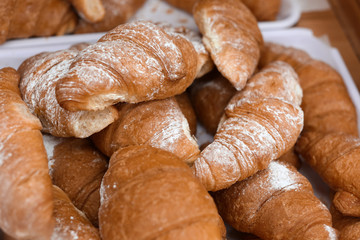 Fresh croissants in bakery