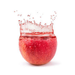 Red apples and apples juice splashing isolated on a white background