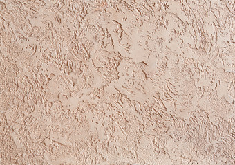 Natural bordoux plaster background with abstract pattern, close-up, macro.
