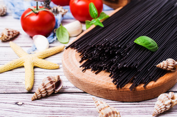 Raw black spaghetti