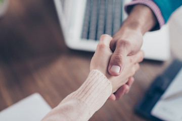 Pass a job interview - close up cropped portrait of shaking hands of successful businessman and candidate, hire a job, making a contract, having a deal